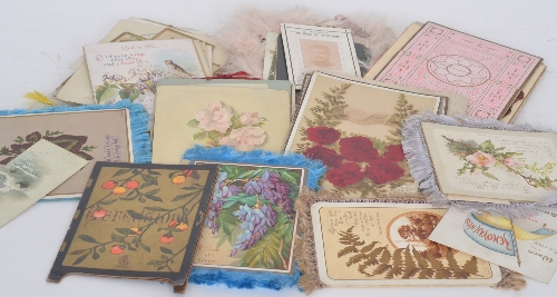 A collection of assorted late 19th and early 20th Century greetings cards, embroidered postcards