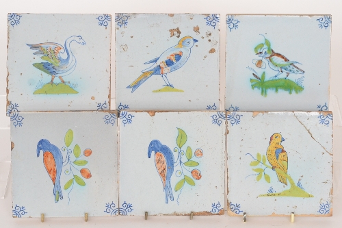 Six 19th Century Delft polychrome plastic clay tiles all decorated with stylised birds, all 5 inch