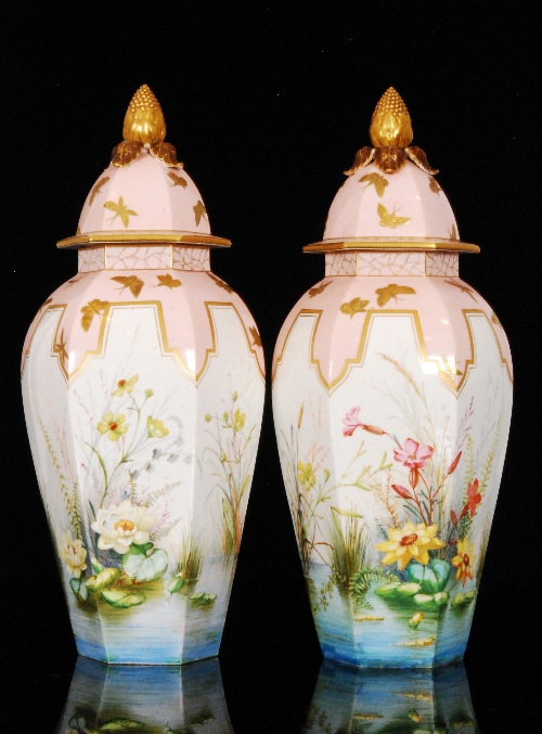 A pair of large 19th Century Royal Worcester hexagonal vase and covers in the Aesthetic manner,