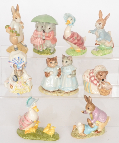 Five assorted Beswick Royal Doulton Beatrix Potter figurines comprising Mrs Tiggy Winkle Washing,