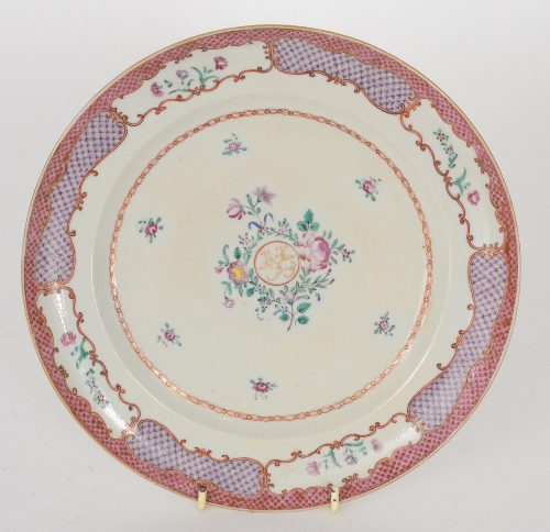 A late 19th Century Samson of Paris armorial plate with pink fish scale border and a central