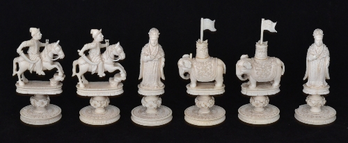 Six early 20th Century Indian carved ivory chess pieces comprising two knights on horse back flying