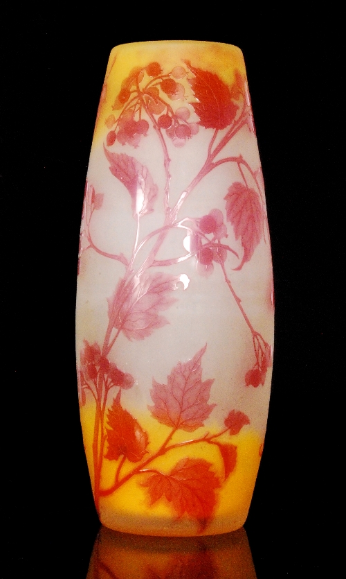 Galle - A large early 20th Century cameo glass vase of swollen sleeve form cased in deep pink over