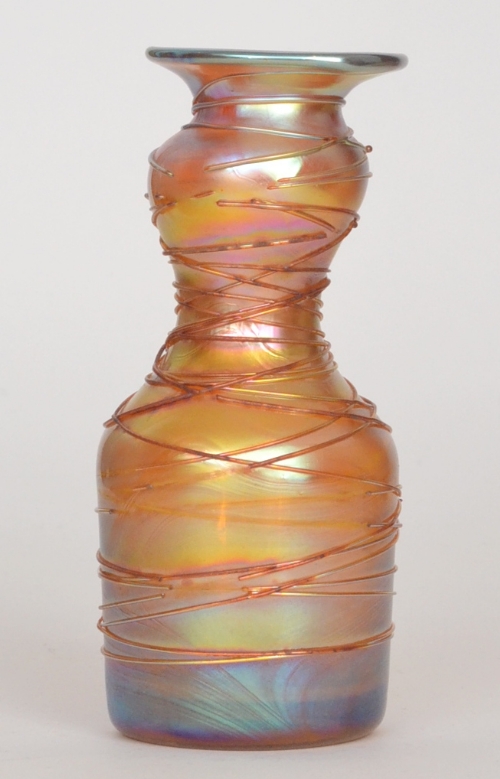 Louis Comfort Tiffany - A Favrille posy vase of shouldered cylindrical form with swollen neck and