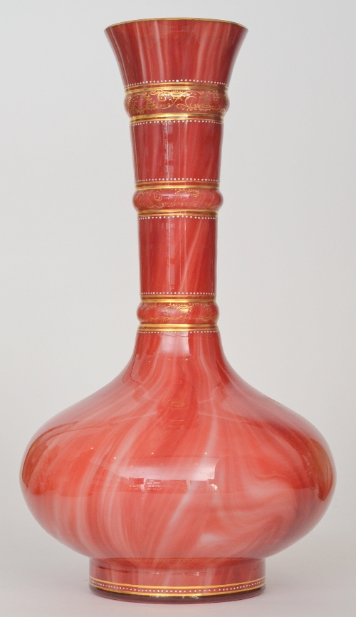 Loetz - A late 19th Century Marmoriertes glass vase of compressed ovoid form rising to a tall