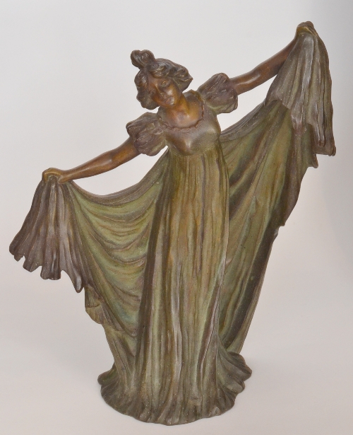 Unknown - A 20th Century Art Nouveau patinated white metal figural lamp modelled as a stylised lady