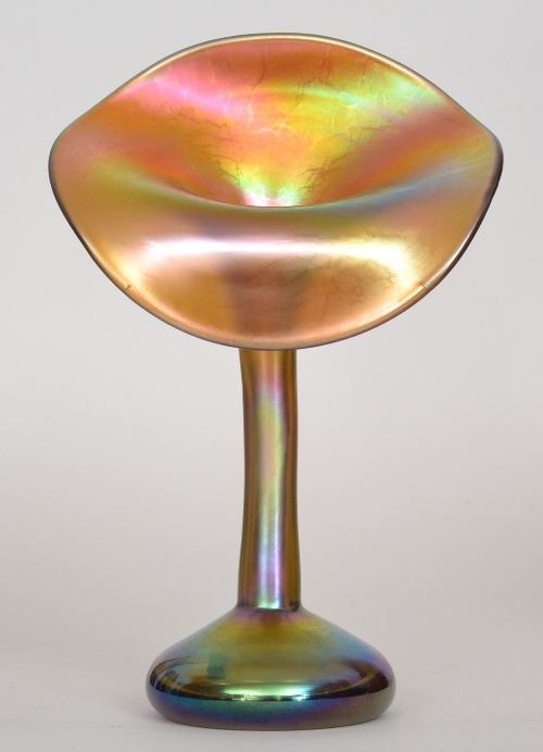 Louis Comfort Tiffany - A Favrille `Jack in the Pulpit` vase with a compressed ovoid base rising to