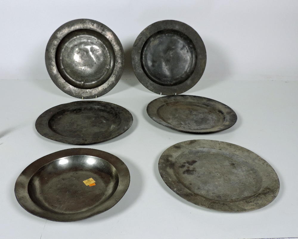 Pewter: A fine antique Irish pewter shallow Bowl Plate, 33cms (13") diam; four large Irish pewter