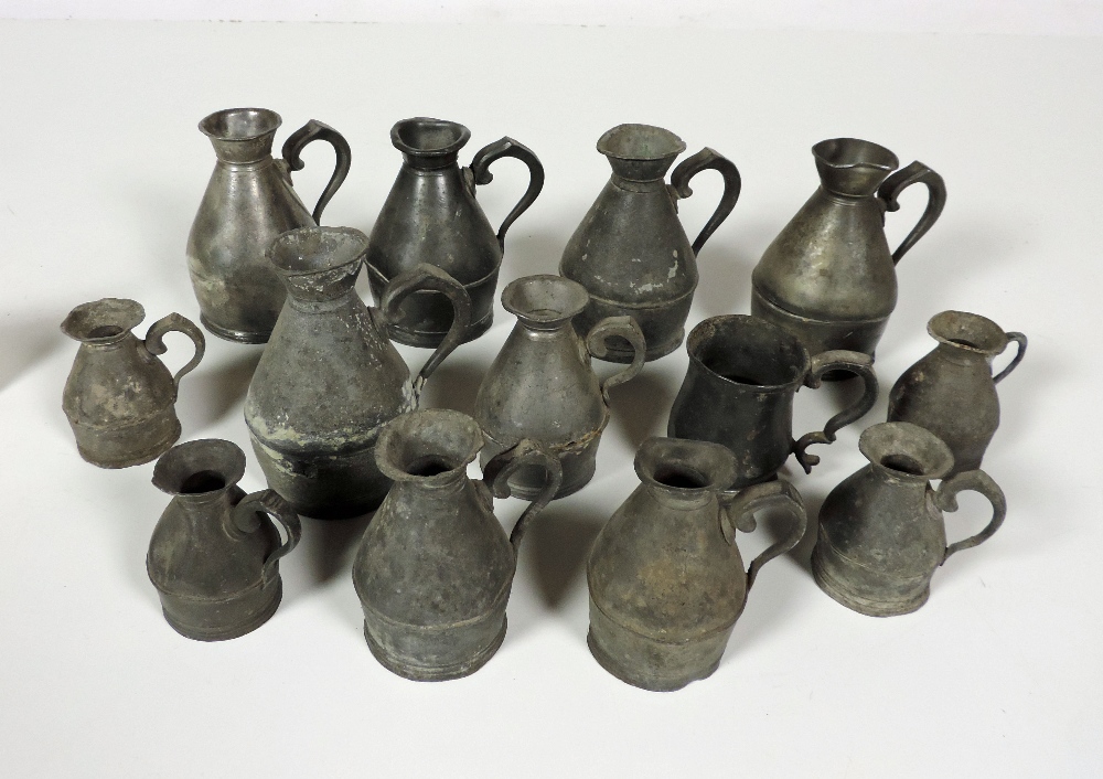 Box: A collection of antique Irish pewter pint, half-pint naggin and other measures, 13 items, as