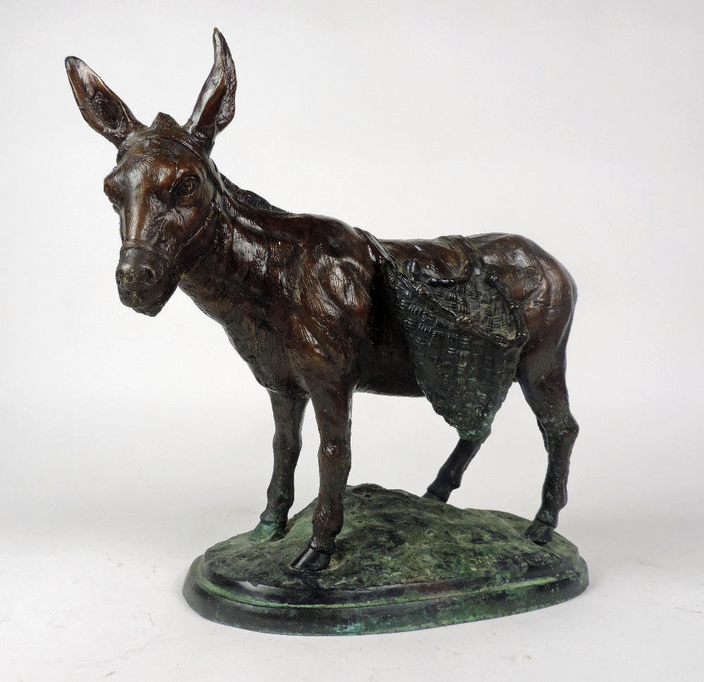 Early 20h Century English School

A delightful, "Model of an old Donkey with saddle bags," inscribed