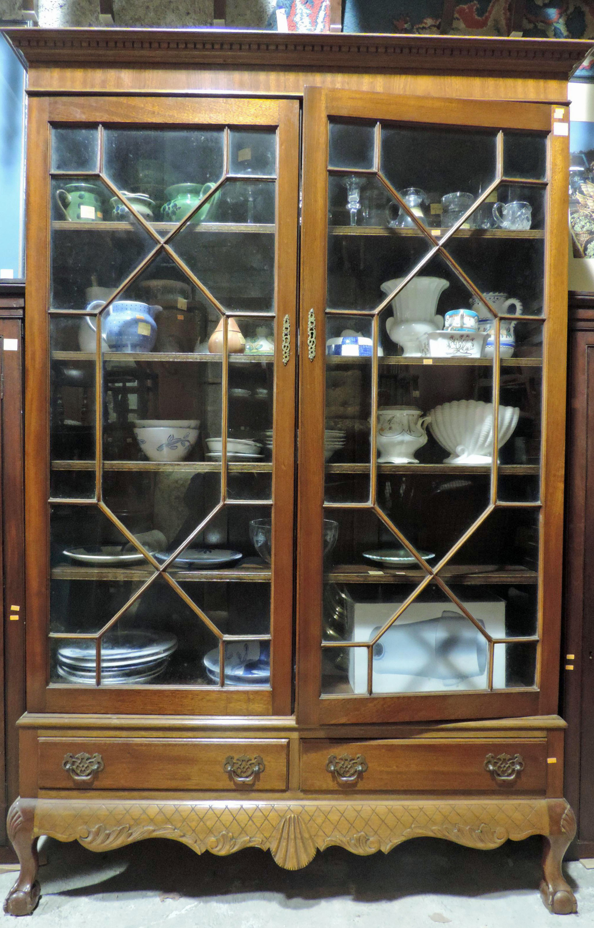 A very good Chippendale style carved mahogany Bookcase or Display Cabinet, by Hicks, Bow Lane,