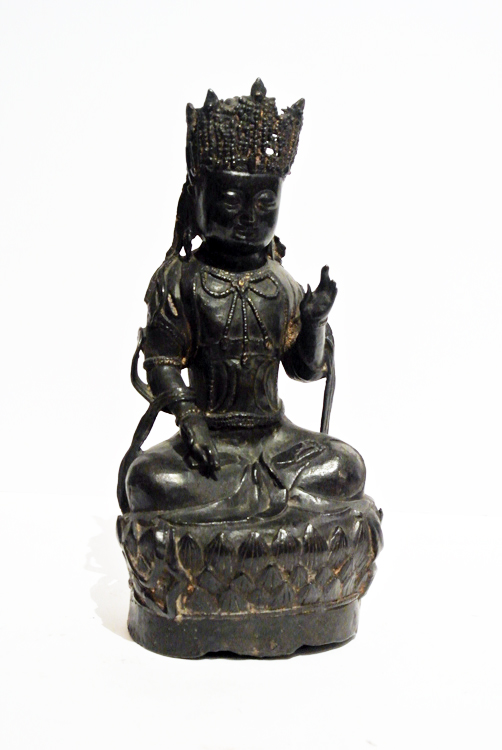 Chinese School second half of the 18th century.  A burnished bronze sculpture depicting `Guanyin`,