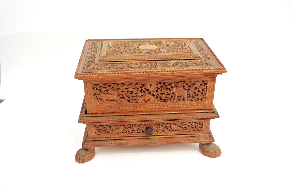 India School late of 19th century. A finely carved wood coffer, with some compartments and a