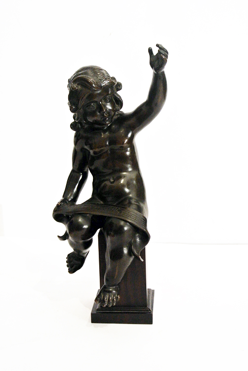 French School 19th century. A very beutiful burnished bronze sculpture depicting a `putto with