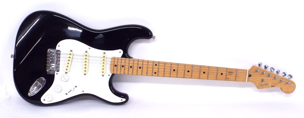 Squier by Fender Stratocaster electric guitar, made in Japan, circa 1993, ser. no. Q019768, black