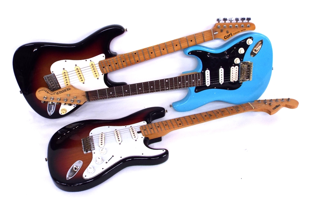 Three Stratocaster style electric guitars, to include Satellite, Hohner & Cort (a.f) (3)