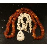 Long angular Baltic Amber necklace toget
