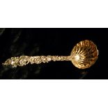 Pretty floral silver sifter spoon with g