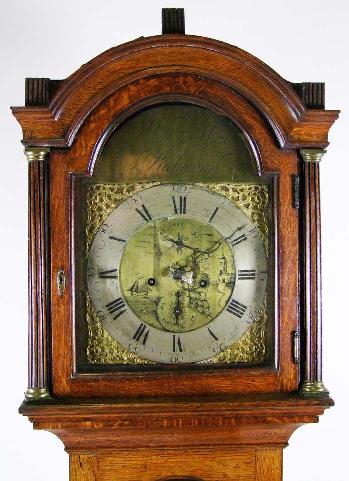 An oak 8-day longcase clock, the 31cm arched brass dial signed William Hall, Richmond, with silvered