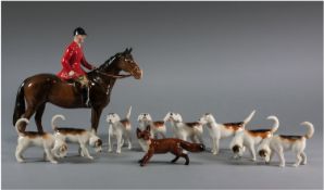 Beswick Huntsman Figure, model 1501 with 8 foxhound figures, model number 943, 944, 941, 942 & fox