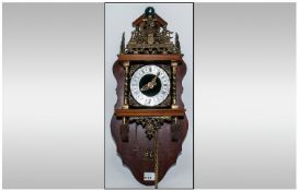 Dutch Freisland Bracket Clock with brass spindels to the dial and crowned with a brass cast figural