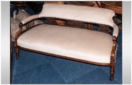 Edwardian Carved Beech Chaise Lounge with Shaped arms supported by spindle design back. The central