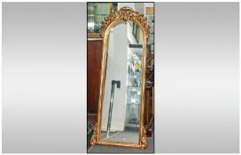 Large Decorative Hall Mirror with rococo style stop. Elaborate gilt frame with bevelled glass. 71``