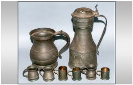 Two Antique Bulbous Shaped Pewter Tankards. 6.5 inches high. Together with 6 miniature shot