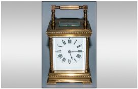Large Late 19th Early 20thC French Brass Carriage Clock with striking movement on a gong, bevelled