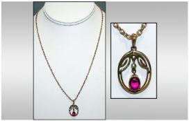 Edwardian 9ct Gold Set Garnet and Seed Pearl Pendant. Fitted to a 9ct Gold Belcher Chain. Length 20