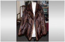 Ladies Musquash Dark Brown Jacket, fully lined. Collar with revers. Slit pockets. Hook & Loop