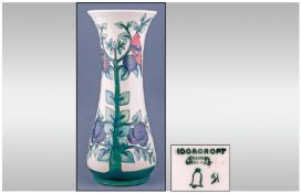 Moorcroft Tall Modern Vase `Plum Tree & Birds Pattern` on ivory ground. Designer Sally Tuffin. 12``