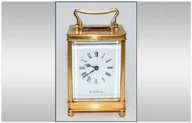 English Good Quality 8 Day Brass Carriage Clock with visible escapement. White porcelain dial. Key
