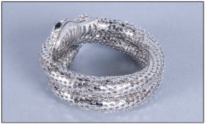 Crystal and Mesh Coil Snake Bracelet, the head and tail covered with white Austrian crystals, with