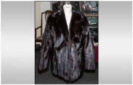 Ladies Three Quarter Length Black Mink Coat, fully lined. Collar with revers, hook & loop