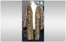 Ladies Sheepskin & Green Suede Coat With Ocelot Print. fully lined. Button Fastening. Approximate