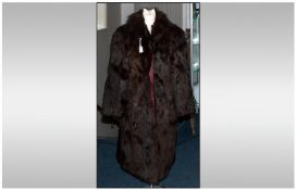 Ladies Black Musquash Three Quarter Length Coat, fully lined. Slit Pockets. Fox Fur Style Collar.