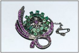 Antique Fine White Metal Set Ruby, Emerald and Diamond Brooch, with safety chain; wheel and bow