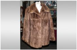 Ladies Musquash Coat, fully lined. Collar with revers.