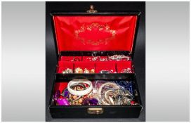 Black Leatherette Jewellery Box Containing A Collection Of Jewellery To Include Beads, Bangles,