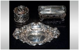 Two Handled Ovoid Silver Pin Dish with repousse scroll and trellis decoration and feature hallmarks