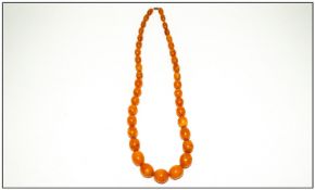 Antique & Quality Natural Butterscotch Graduated Amber Bead Necklace. 26 in length. 87.2 grams.