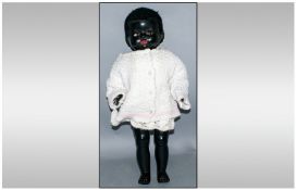 22`` 1950`s Black Pedigree Doll, good condition, even has the ribbon loop in the Astrakhan hair.