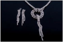 White Crystal Necklace and Earrings Set, the necklace comprising a `circle of life` pendant with a