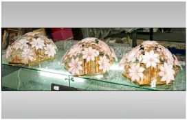 Set Of Three Brass Effect Ceiling Lights With Pale Pink Glass Flower Decoration.