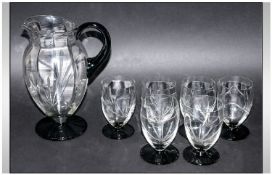 Art Deco Style Lemonade Set Comprising Jug And Six Glasses, smoked glass colour with black base.
