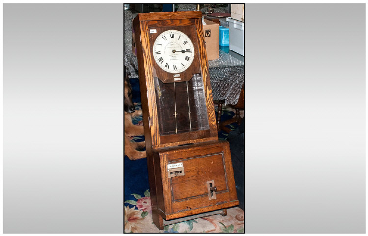 Oak Cased Factory Clocking in Clock by The Gledhill Brook Time Recorders LTD. Electrically
