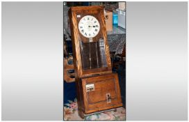 Oak Cased Factory Clocking in Clock by The Gledhill Brook Time Recorders LTD. Electrically