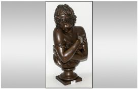 A Classical Semi-Nude Female Cased Bronze Bust. 23`` in heigh. Un-Distinguishable marks to base.