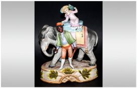 Gebruder Heubach Rare Bisque Figure Group. c.1890`s ` Girl Seated on a Elephant With a Black